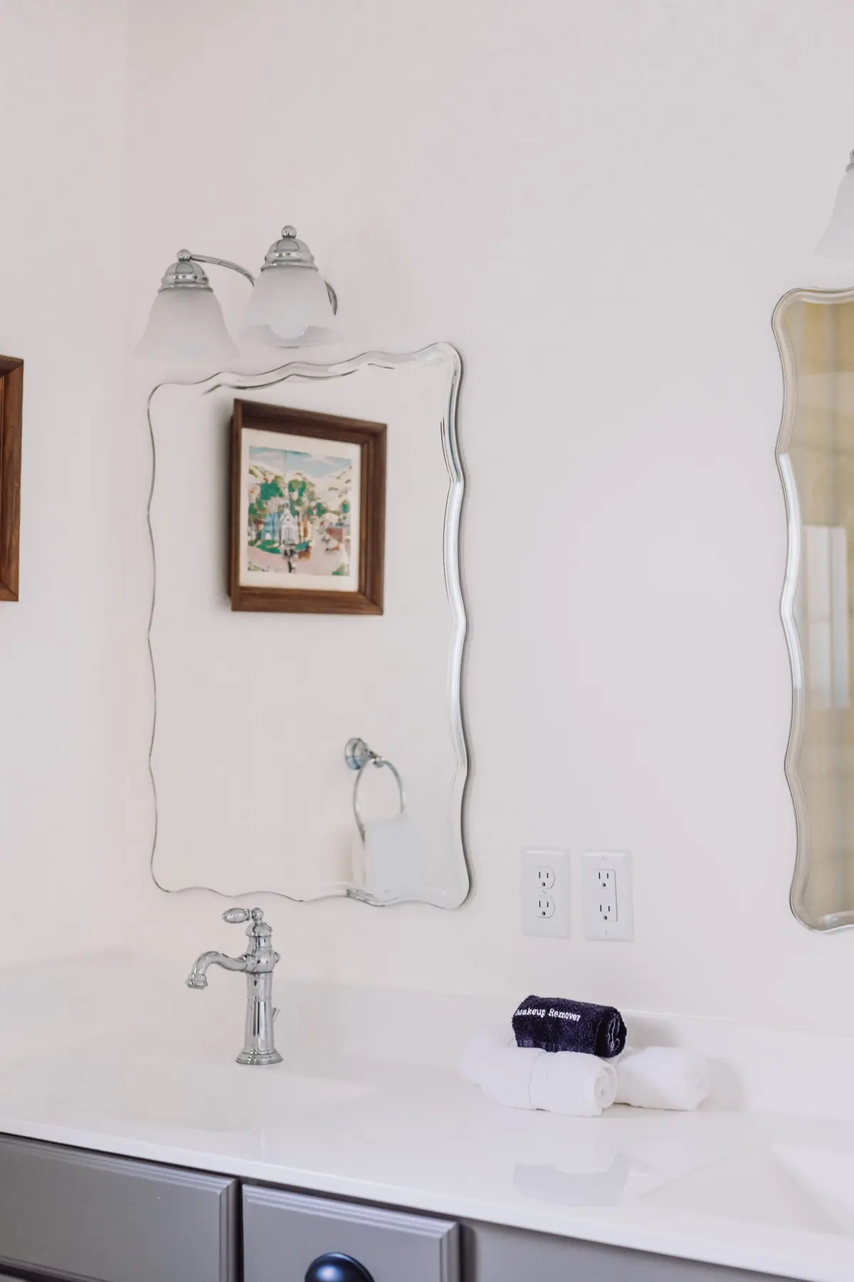 Austen Room bathroom vanity with mirror and complimentary toiletries