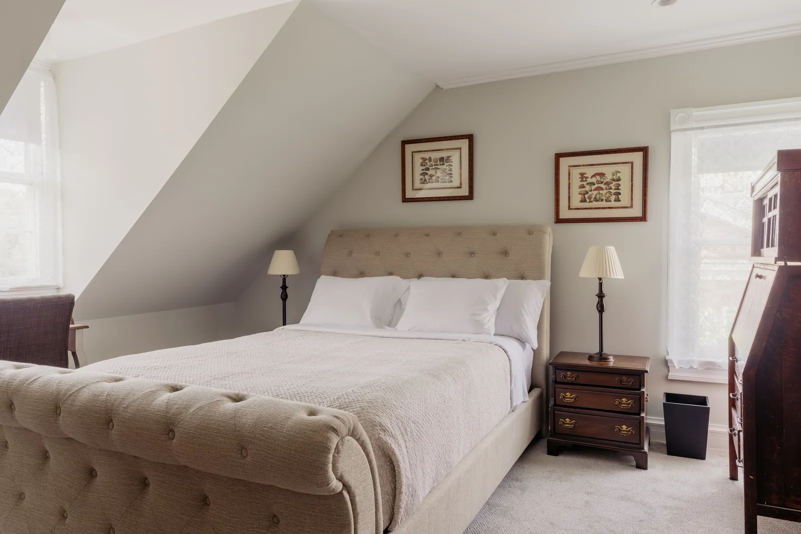 The Edison Room at Armistead House, showing a queen bed with classic furnishings